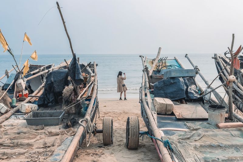 Fishing boats resting by the shore in the off-season