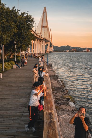 Locals in Shantou can catch the sun setting on the sea simply by strolling to a park