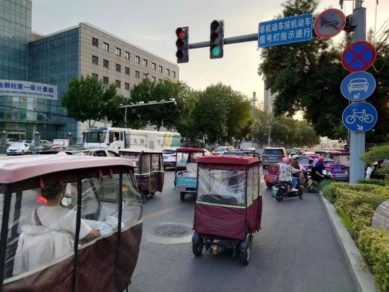 The one special thing about Xinxiang: everyone is partial to three-wheeled electric scooters