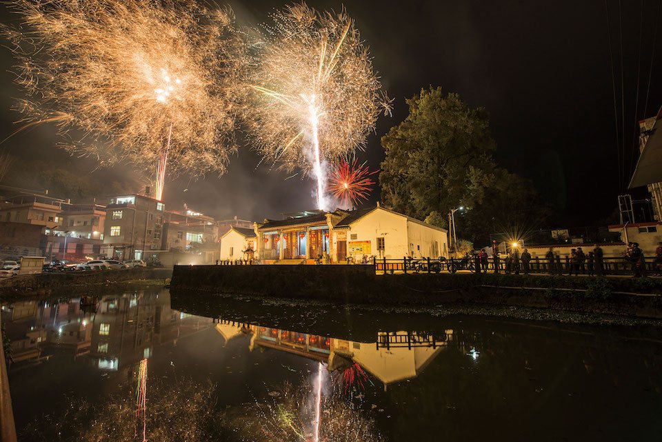 The ceremony concludes with fireworks, symbolizing prayers for clean water that will preserve the health of all villagers