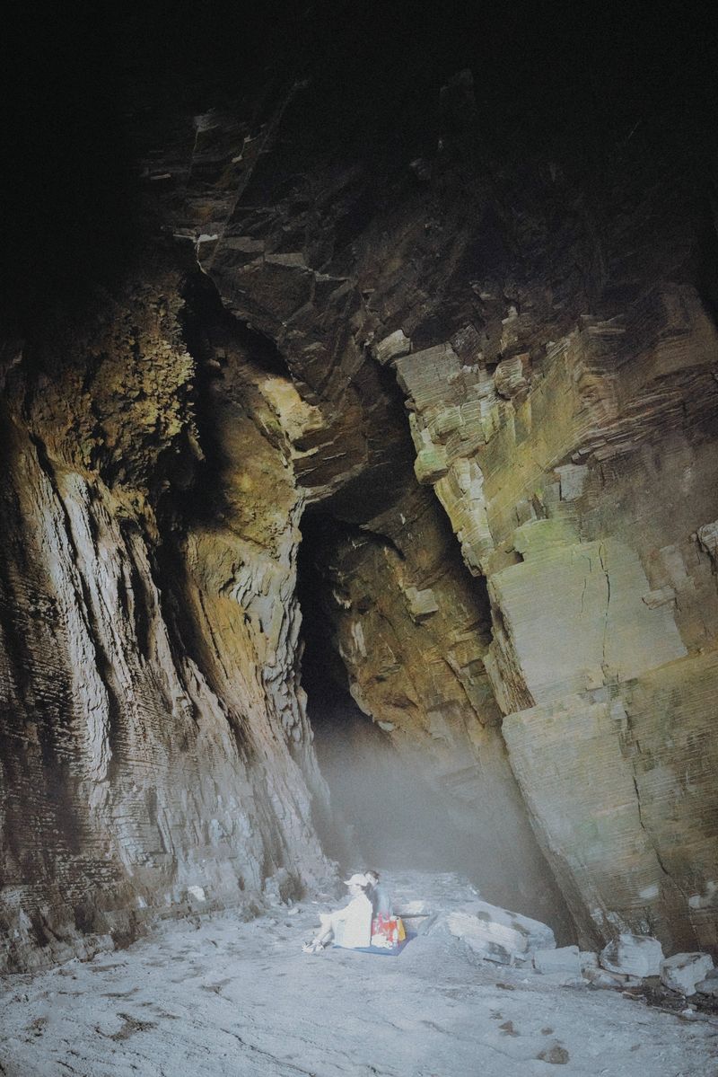People hang out in a misty cave to avoid the heat of summer in Hunan province.