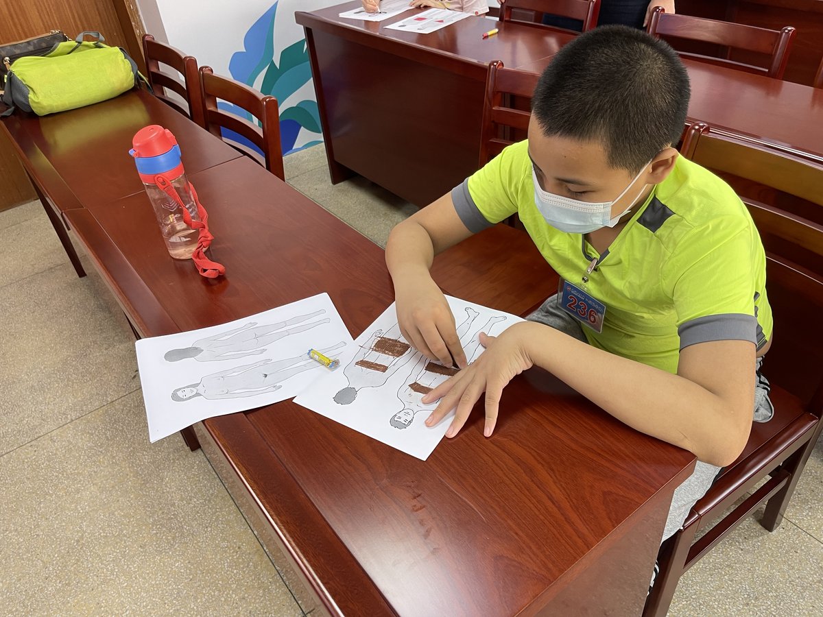 student learning about the body in a sex education class in China