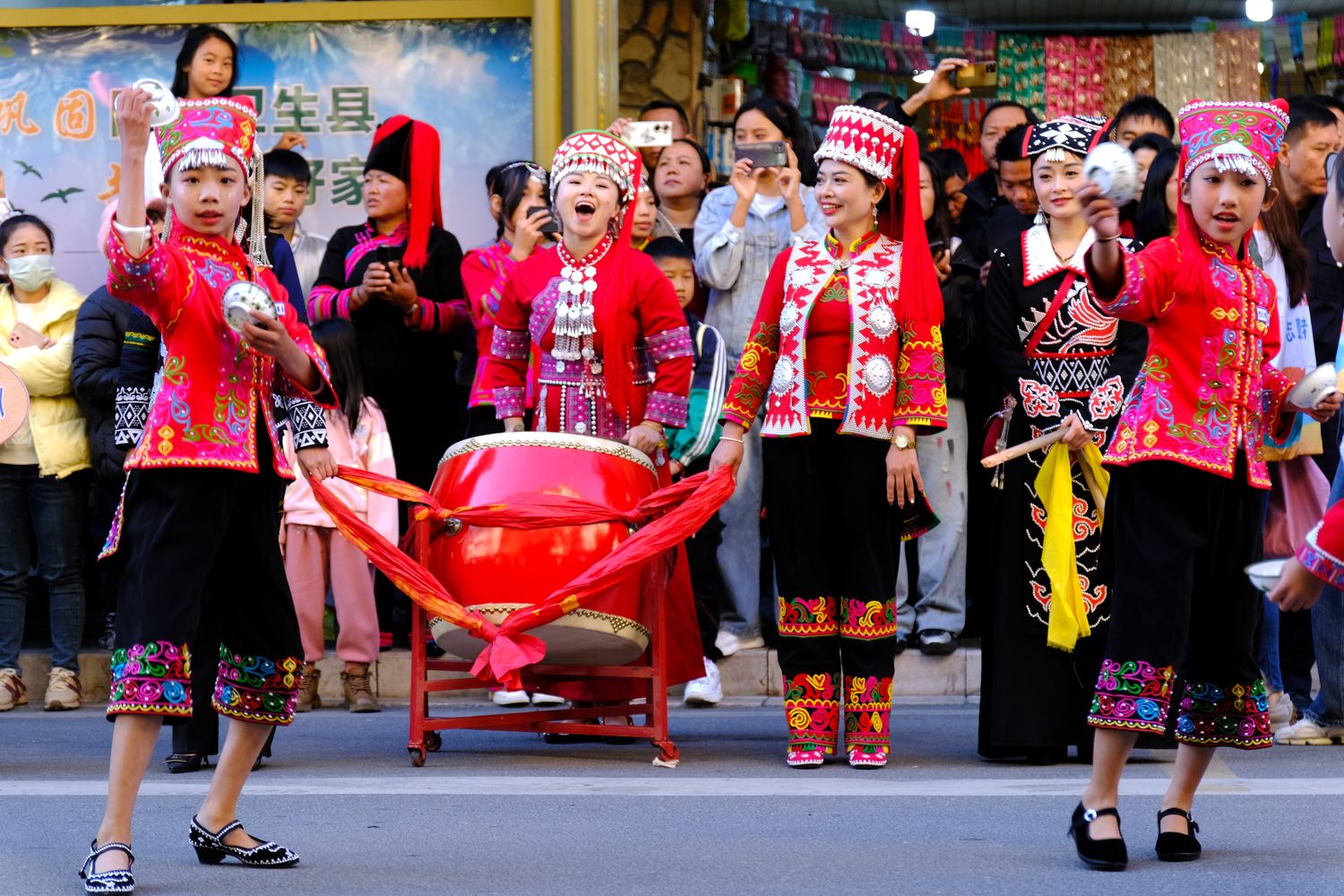 Hani women participating in the morning celebrations along Daxing Street