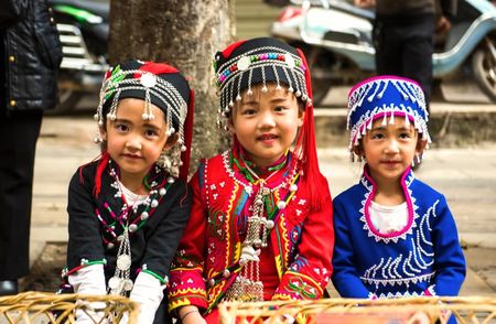 Hani children eating at Long Street Banquet