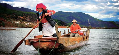 Mosuo Family on a boat