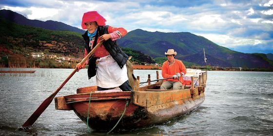 Mosuo Family on a boat