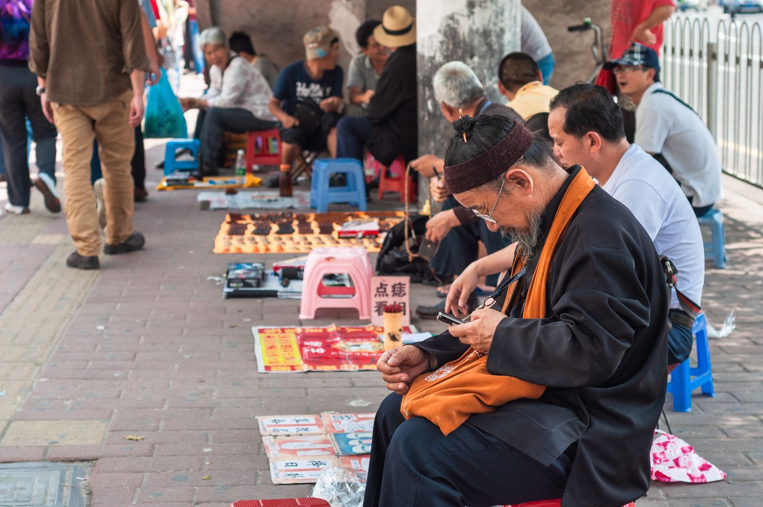 A fortune teller waiting for patrons on the streets of Guangzhou, Guangdong province (2012)