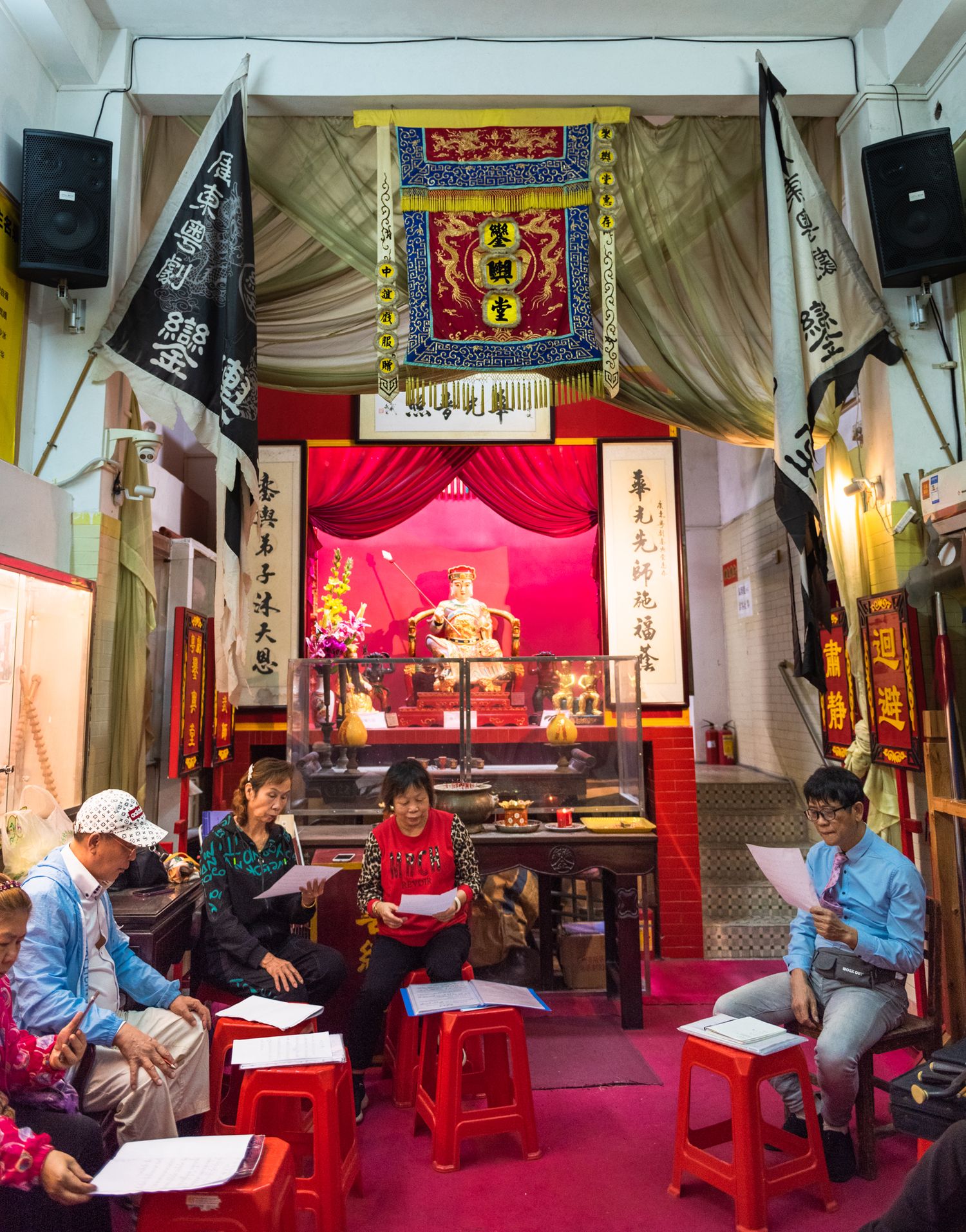 An amateur Guangdong opera troupe rehearsing. In the Pearl River Delta region where the opera enjoys a large fan base, amateur groups have active roles in keeping the art form alive. (2021)