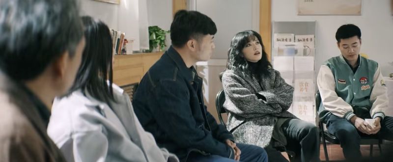 Still from Chinese TV show “Rock It, Mom,” showing a Chinese Alcoholics Anonymous meeting