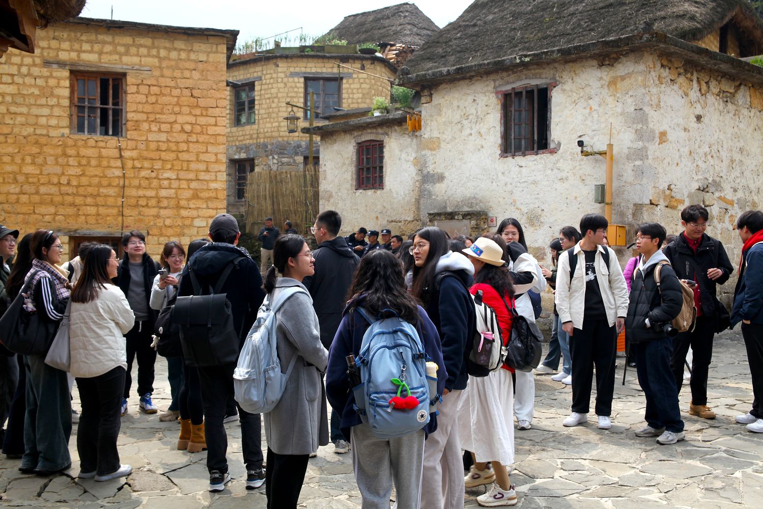 Chinese students from Fudan, Zhongshan, and Yunnan universities attending the ceremony