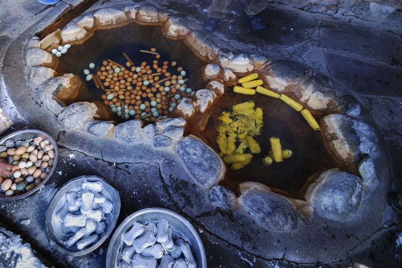 Boiling eggs in the hot springs at Changbai Mountain in Jilin