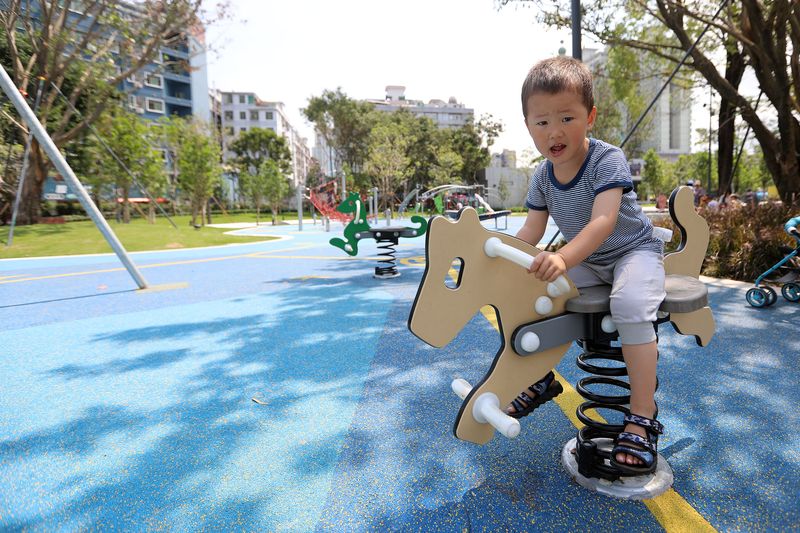 Toddler playing on a playground in Shenzhen