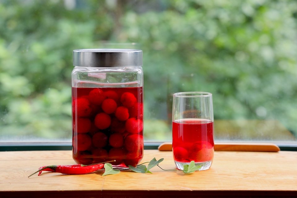 A freshly made jar of Yangmei Jiu (杨梅酒), Ningbo Cuisine