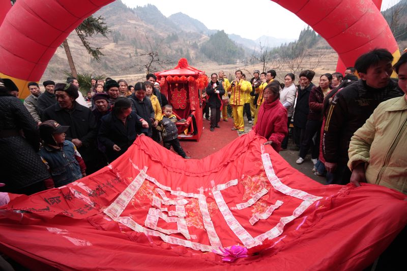 Betrothal gifts being given during a wedding in Hebei province