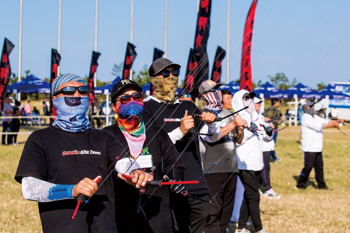 Stunt kite enthusiasts take their quad-line kites out for a spin in September 2020, during the delayed 37th Weifang International Kite Festival