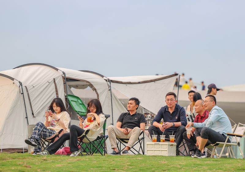 Campers at ”Sky City” in Haikou enjoying the outdoors, China’s camping craze
