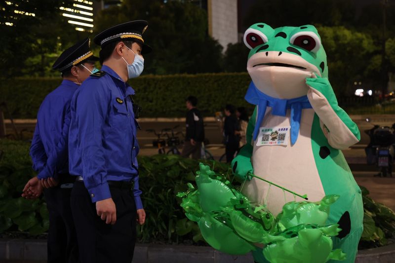 Top Stories of 2023 in China, frog costume, sad frog, frog balloons