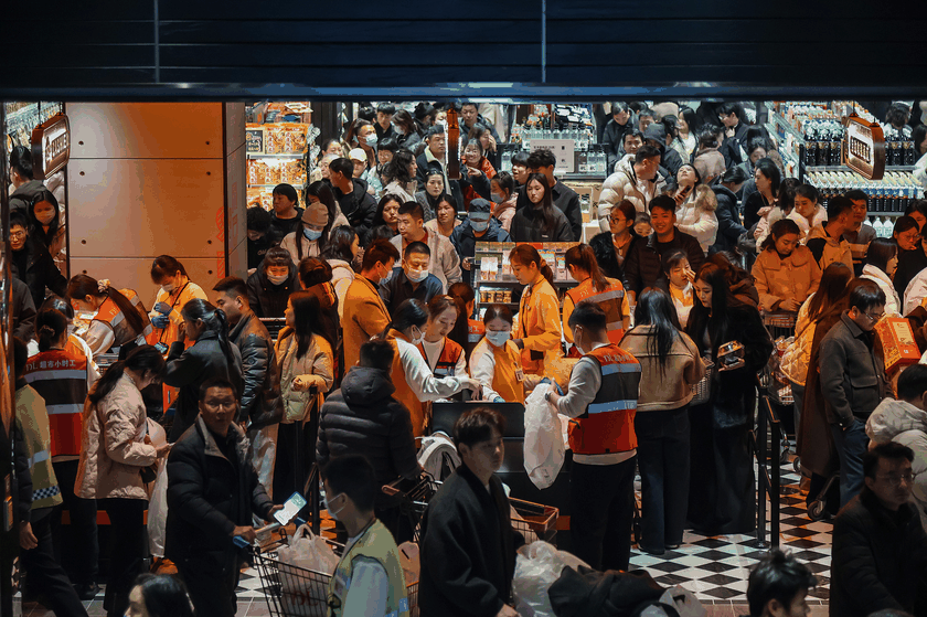 Customers in Pangdonglai, a Chinese local supermarket chain in Xuchang