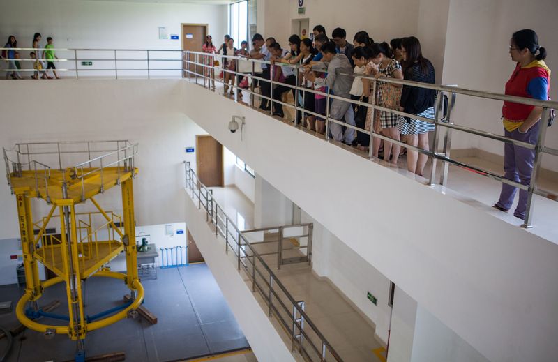 Children visit the Daya Bay reactor on a school excursion, in images made available to state media