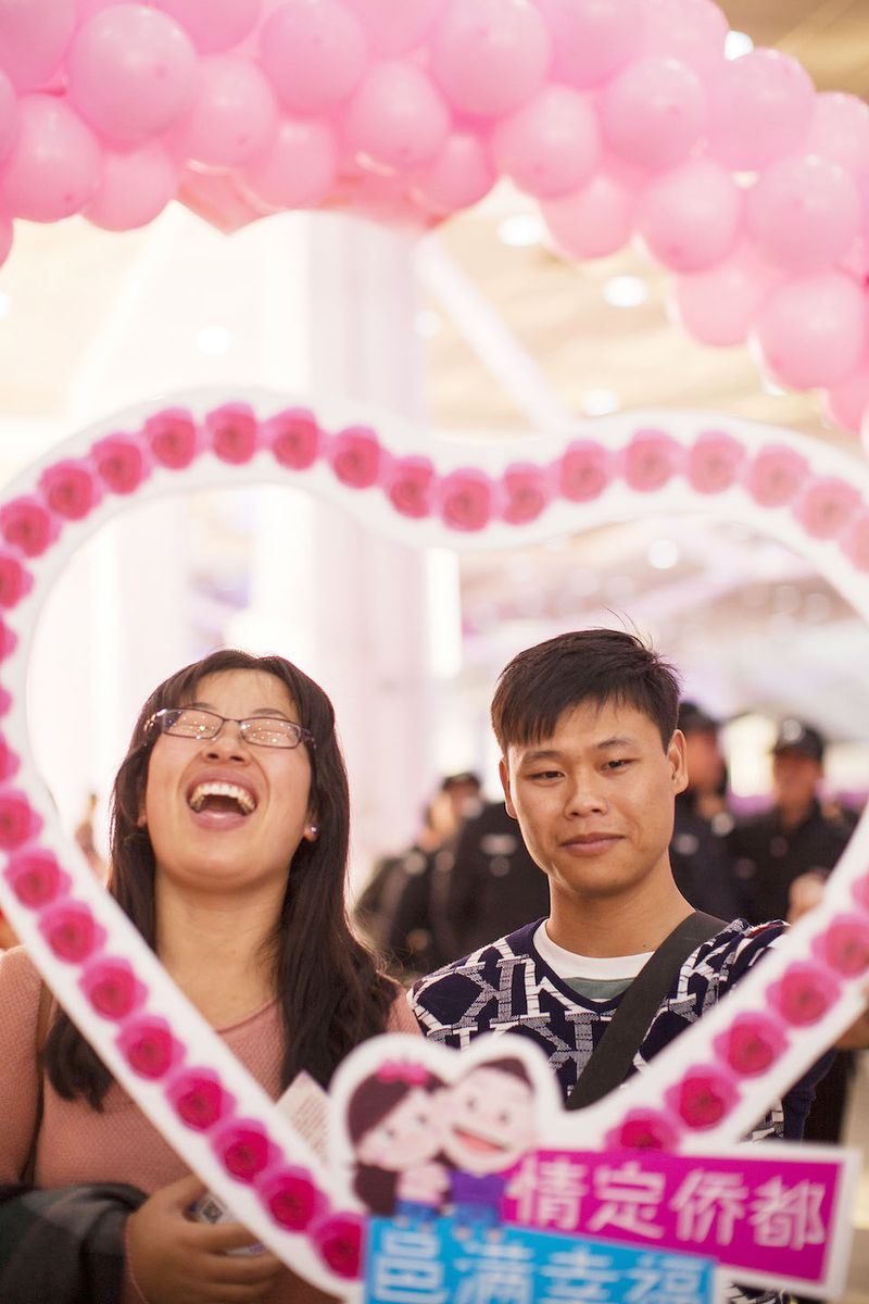 A couple is successfully matched at a speed-dating event in Jiangmen, Guangdong province