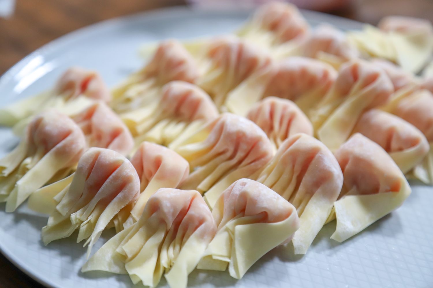 Shrimp wontons being prepared