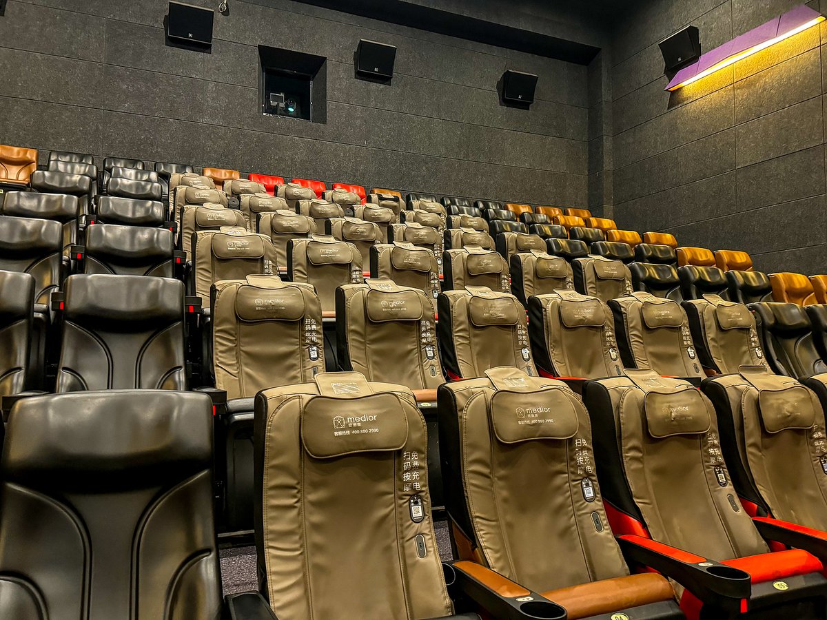 A cinema in Wuhan with various types of massage chairs