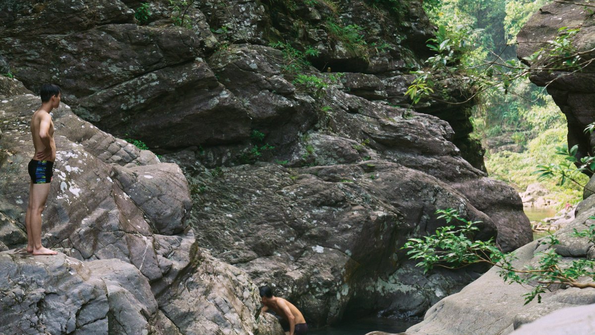 Zhuang villagers swimming in The Mountains Sing (Yang Xiao)