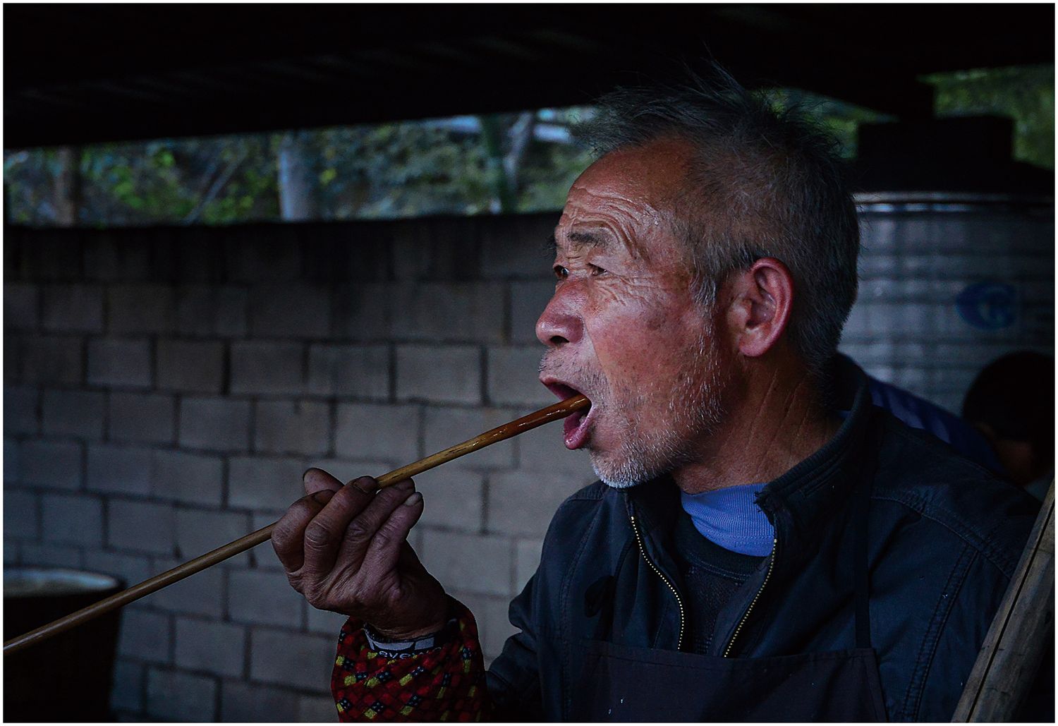 As the syrup boils, workers must periodically sample it for the taste