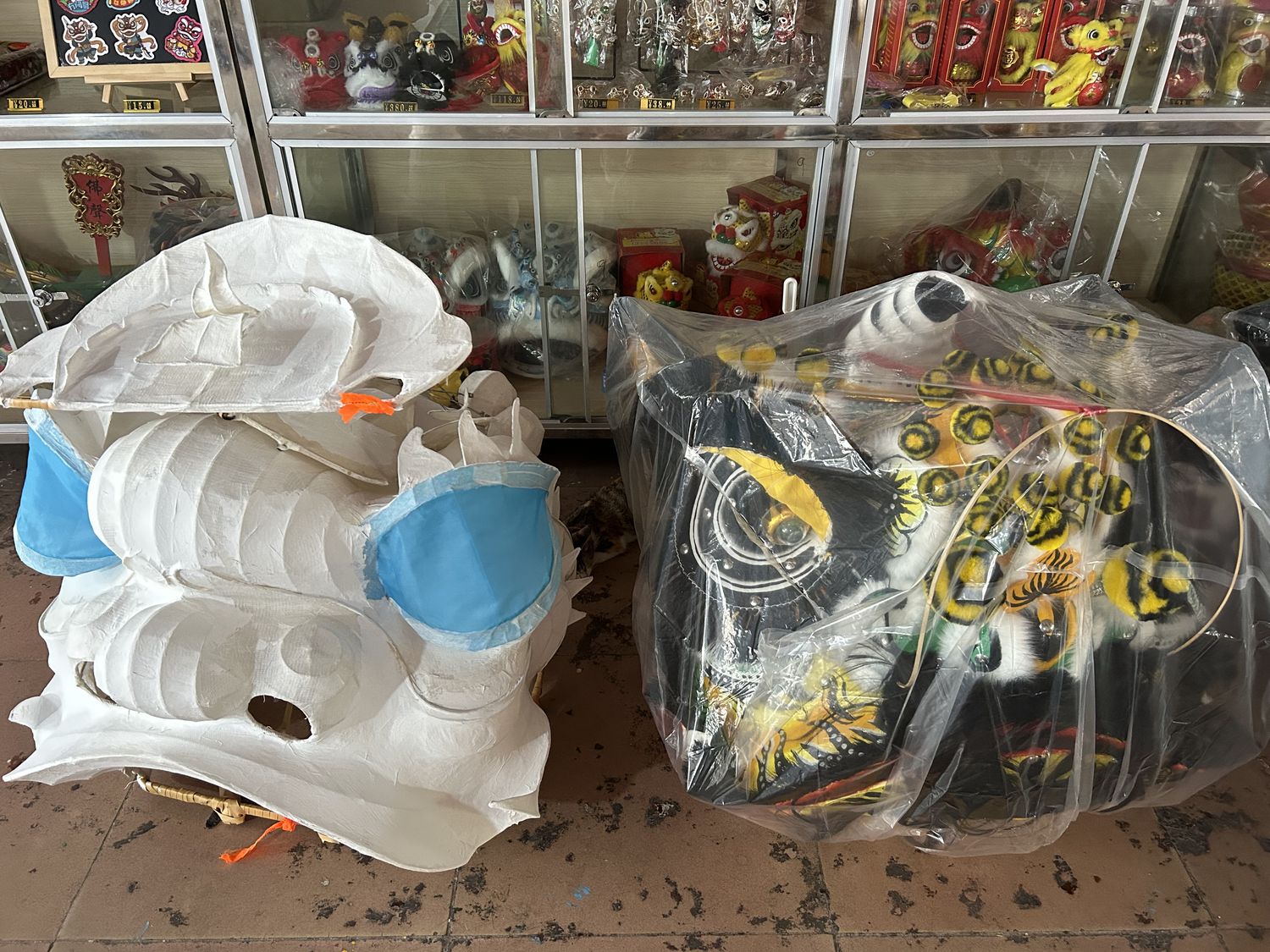 Chinese dancing lion head painted in a factory