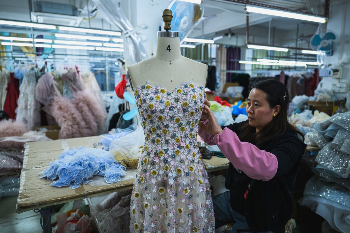 Machines are currently unable to handle many of the intricate details involved in creating premium customized gowns in Chaozhou wedding dress factories