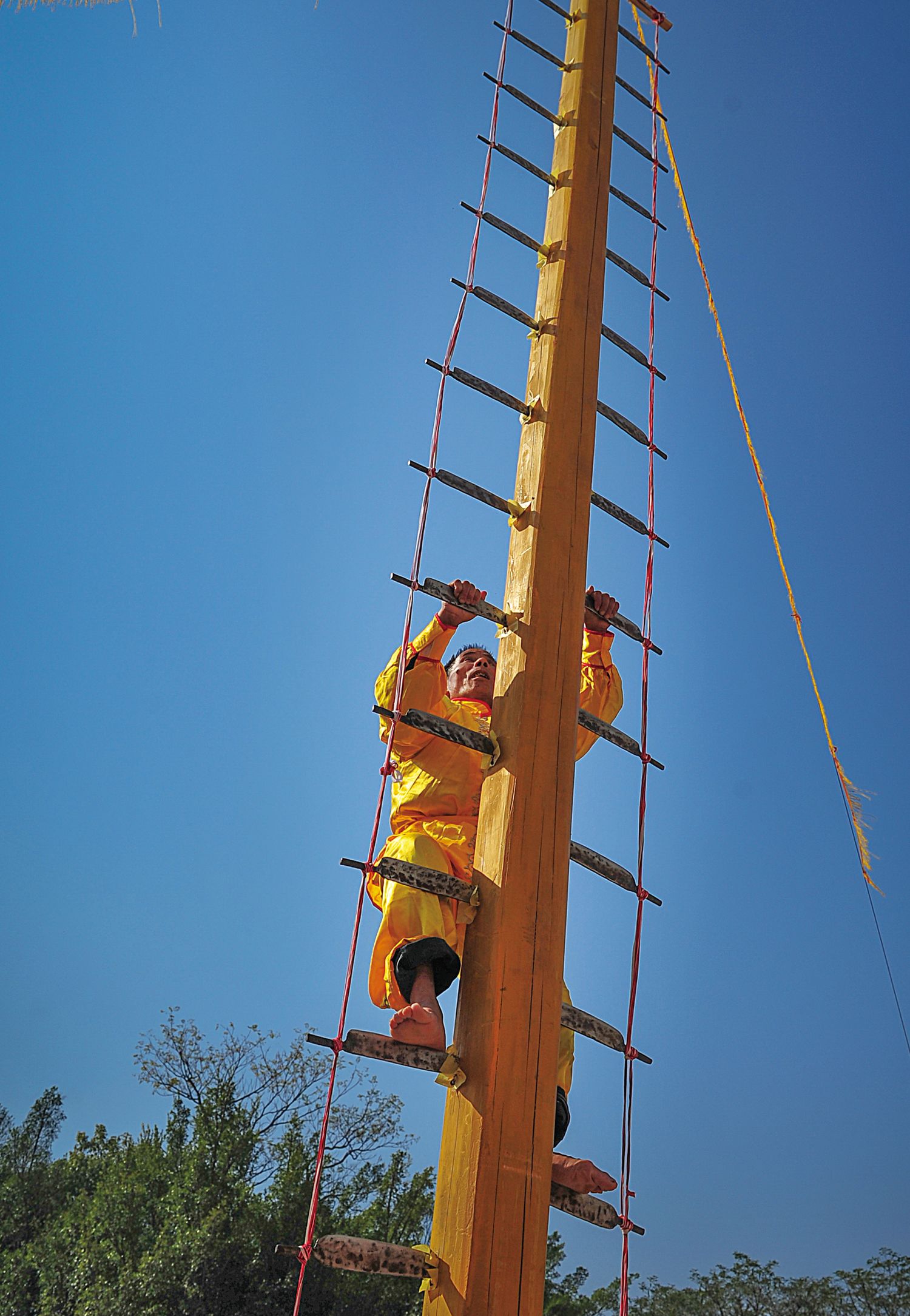 “Climbing the mountain of swords” is a ritual also found among the Miao and other ethnic minority groups in China’s southwest