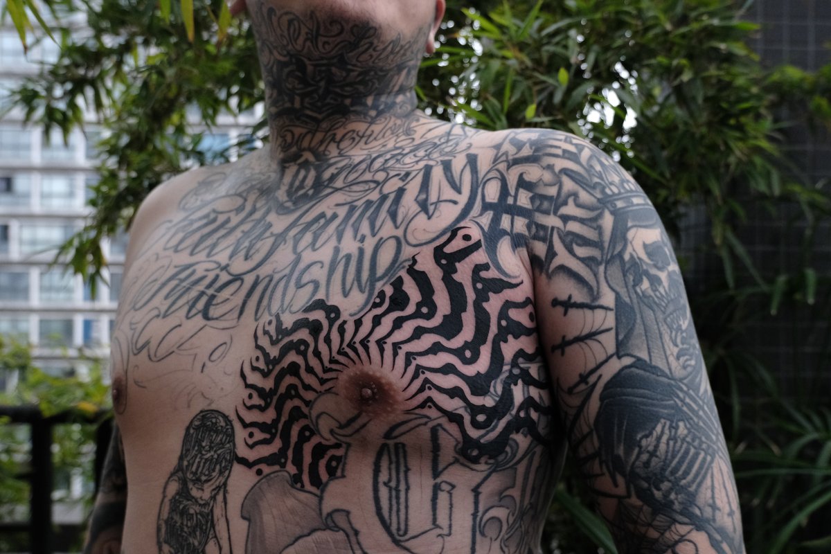 Image of bio-mechanical chest tattoo